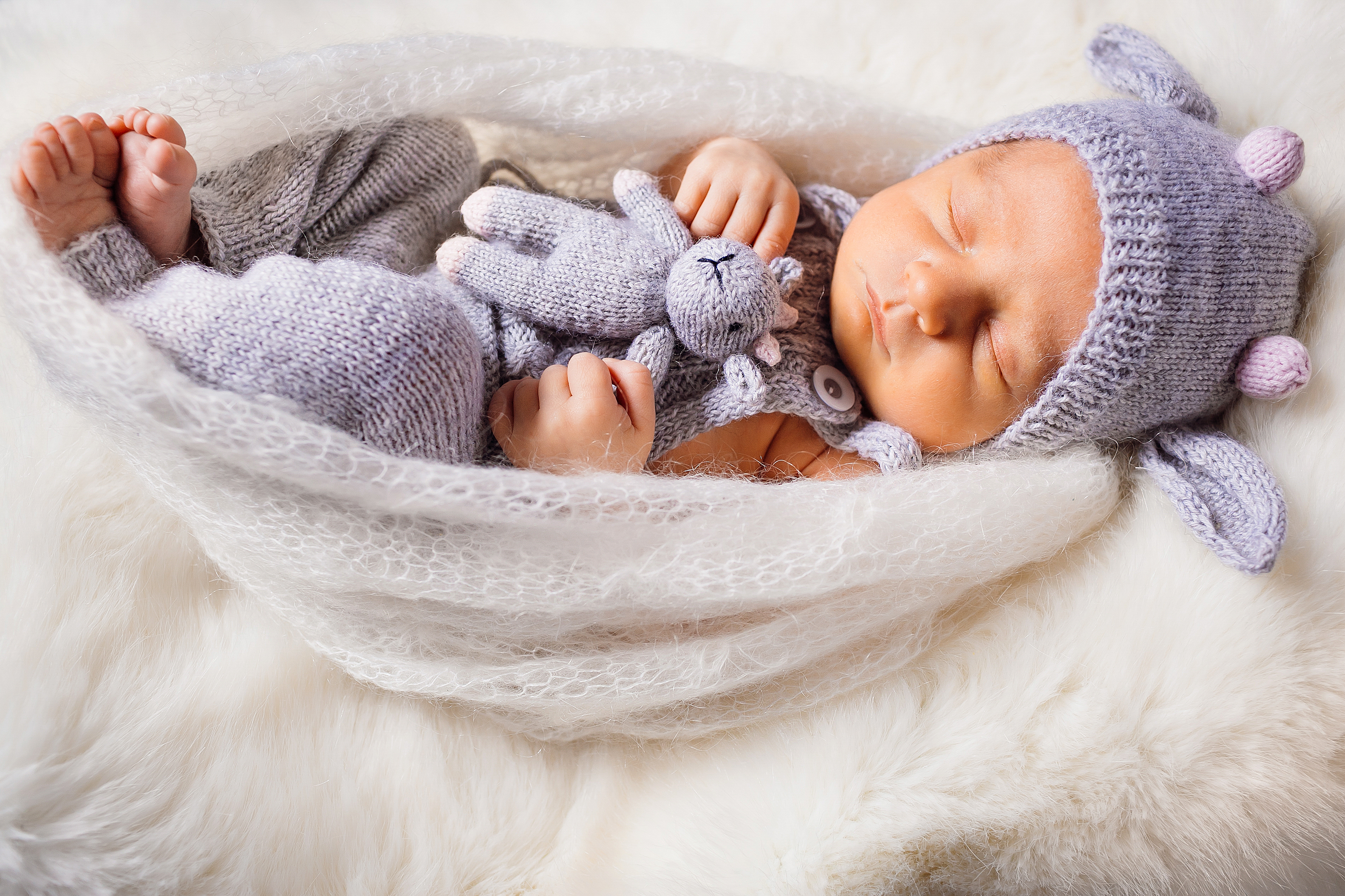 Hold varmen med en uld dragt til din baby